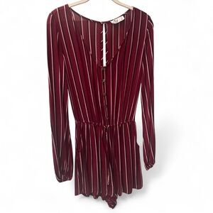 Burgundy striped romper with long sleeves and button-up front